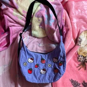 purple hello kitty medium crescent baggu